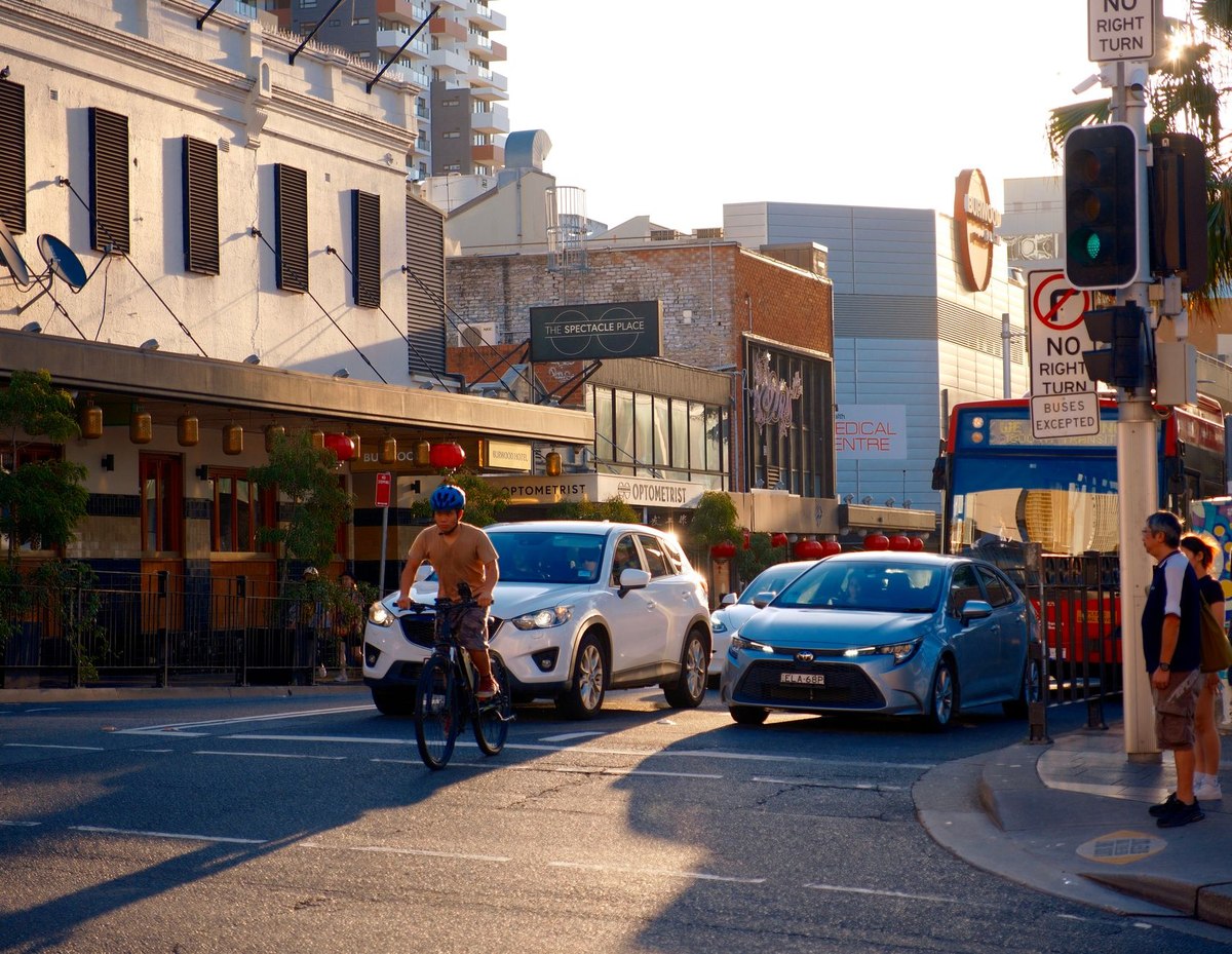 A mortgage broker consulting with a client in an office in Australia