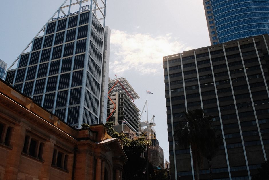 Impressive skyscrapers in Sydney's business district on a sunny day.